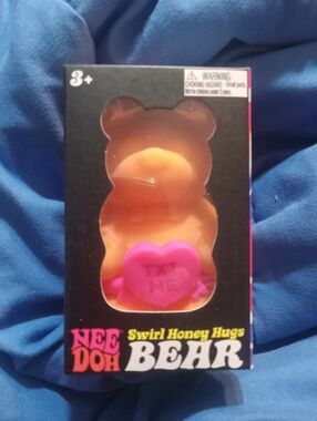 NIB Nee Doh Swirl Honey Hugs Bear Orange